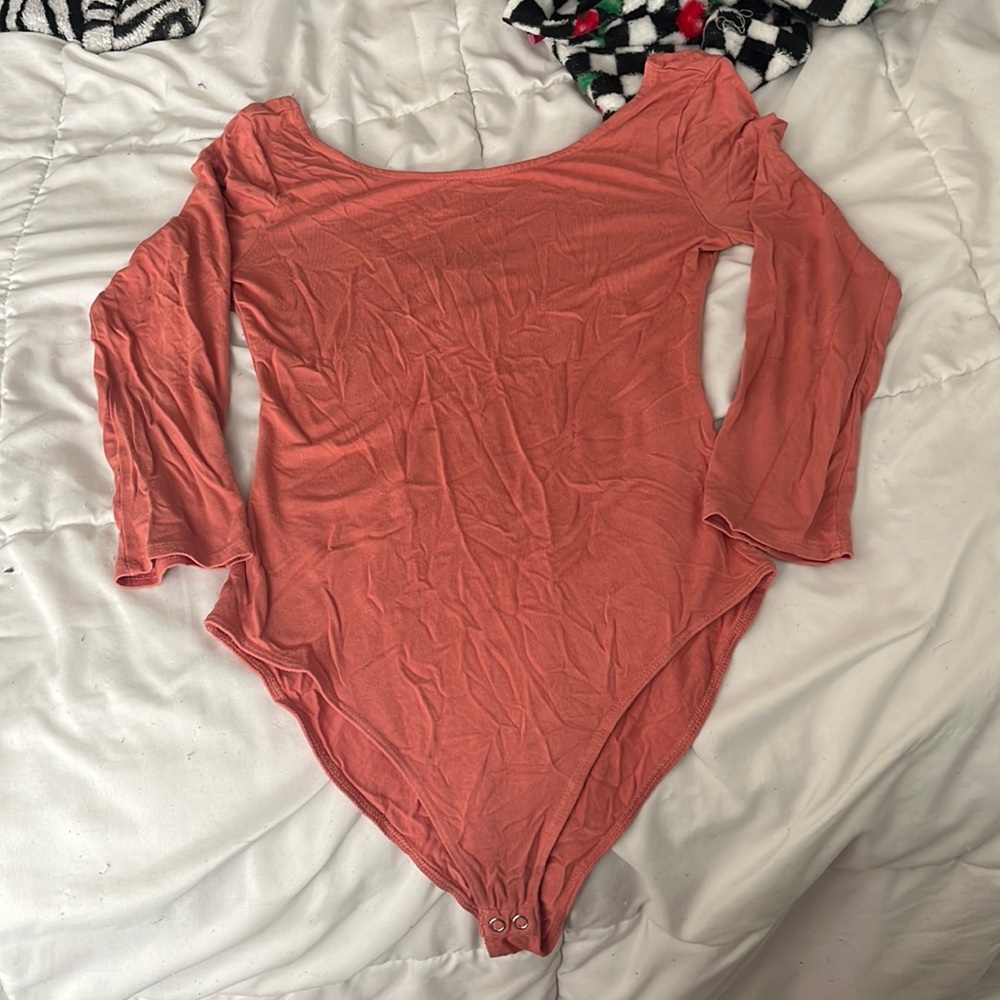 Pink/orange body suit